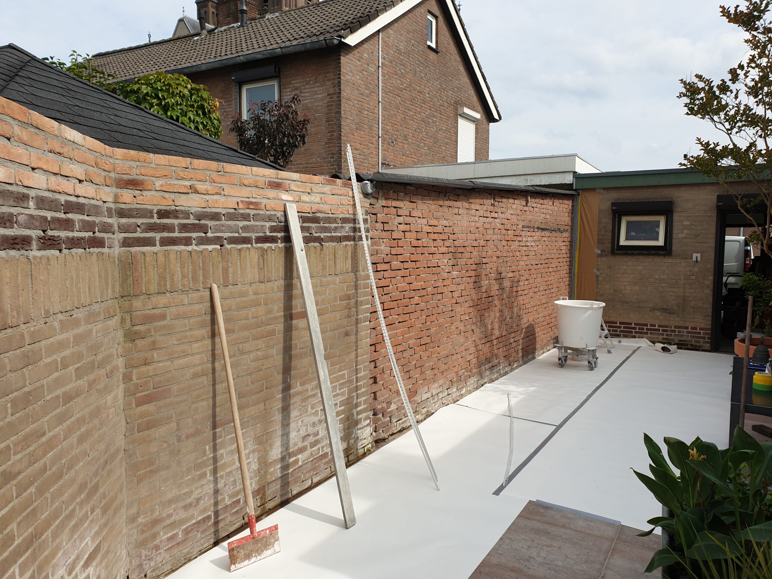 Cementpleister buitenmuur