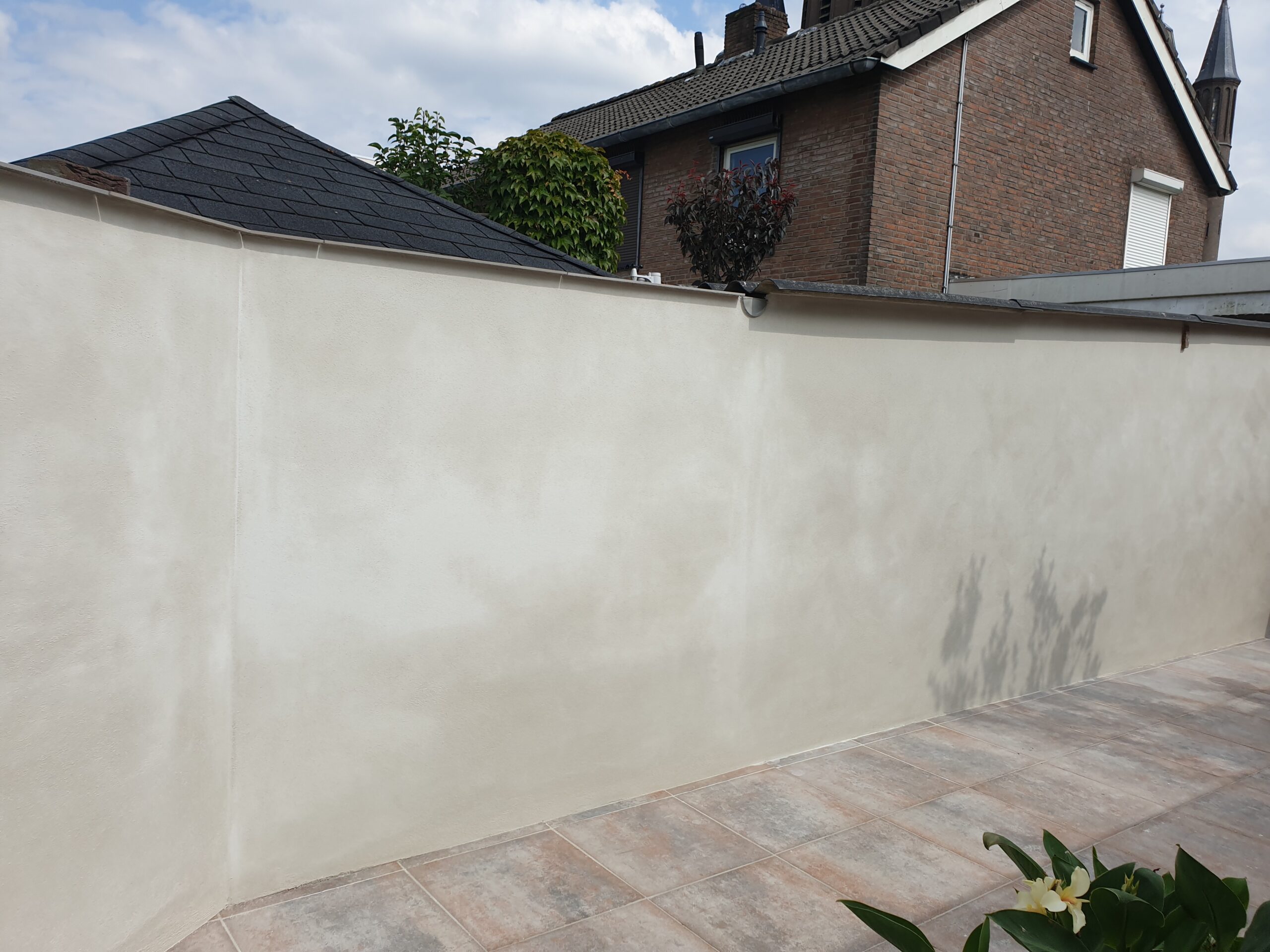 Cementpleister buiten gevelrenovatie
